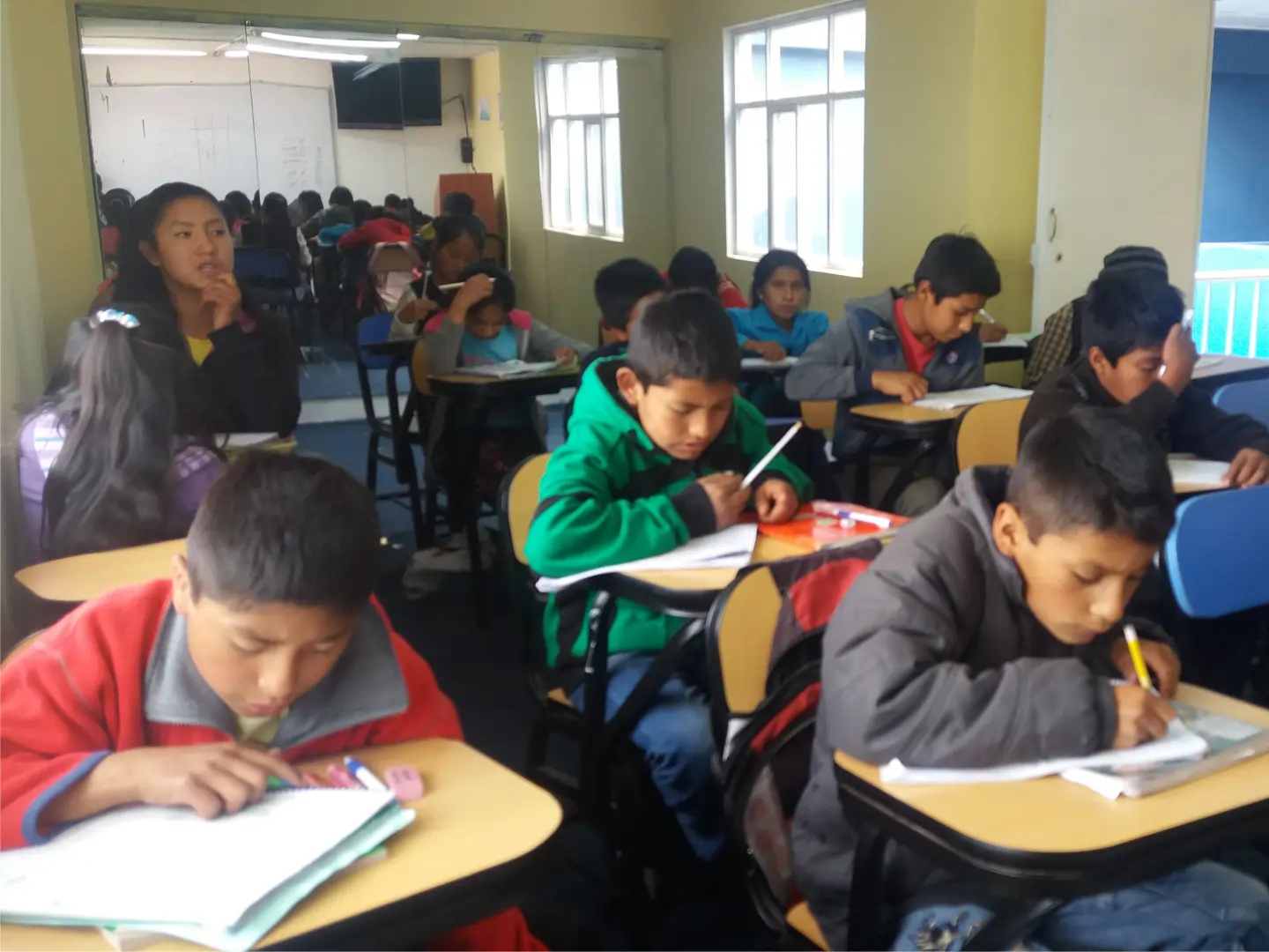 Scholarship students from rural areas outside Huaraz studying for international exams at Langcom.